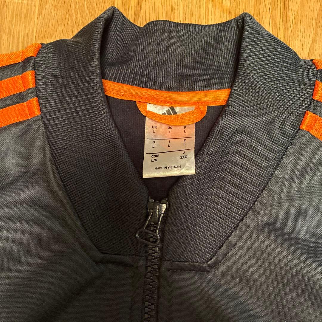 レアル・マドリード adidas ジャケット 黒/オレンジ