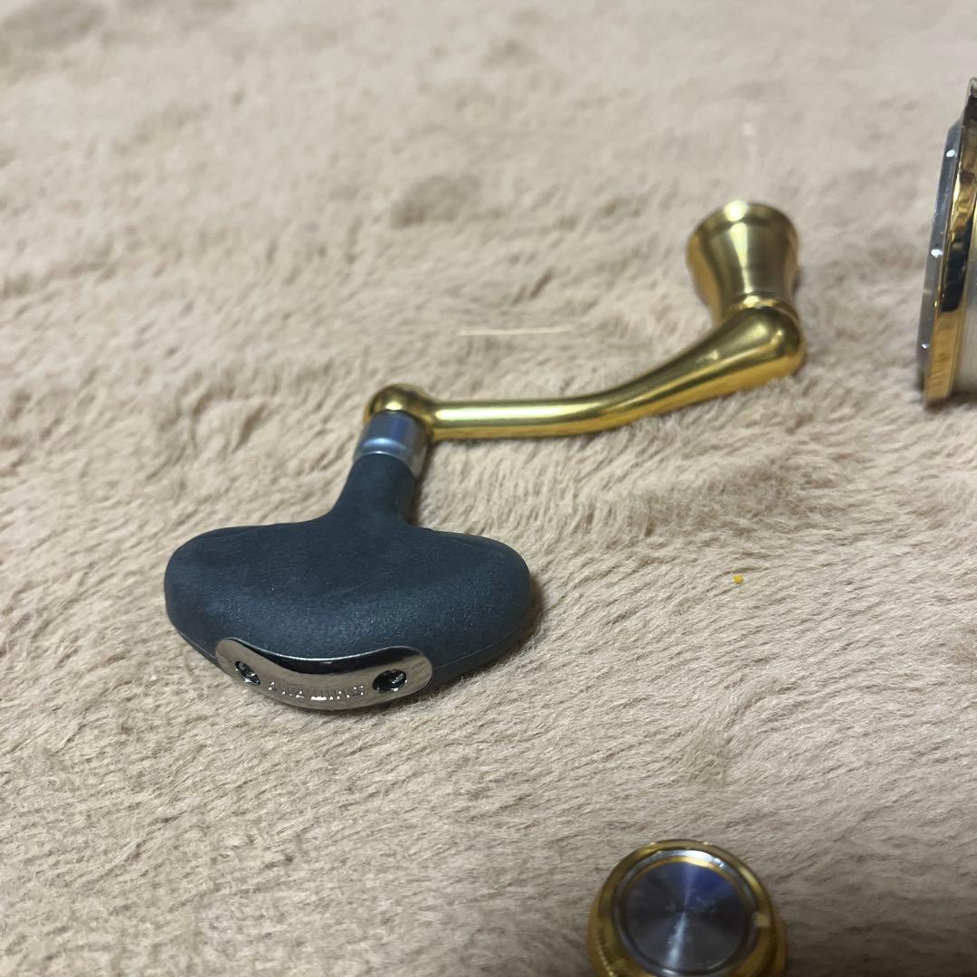 ステラ4000xgスプールと シマノ4000番クラスのハンドル２個、キャップ