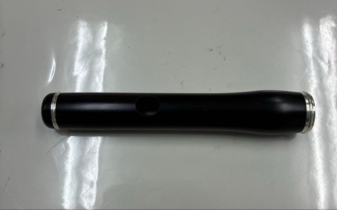 黒い木製ピッコロ用アクセサリー