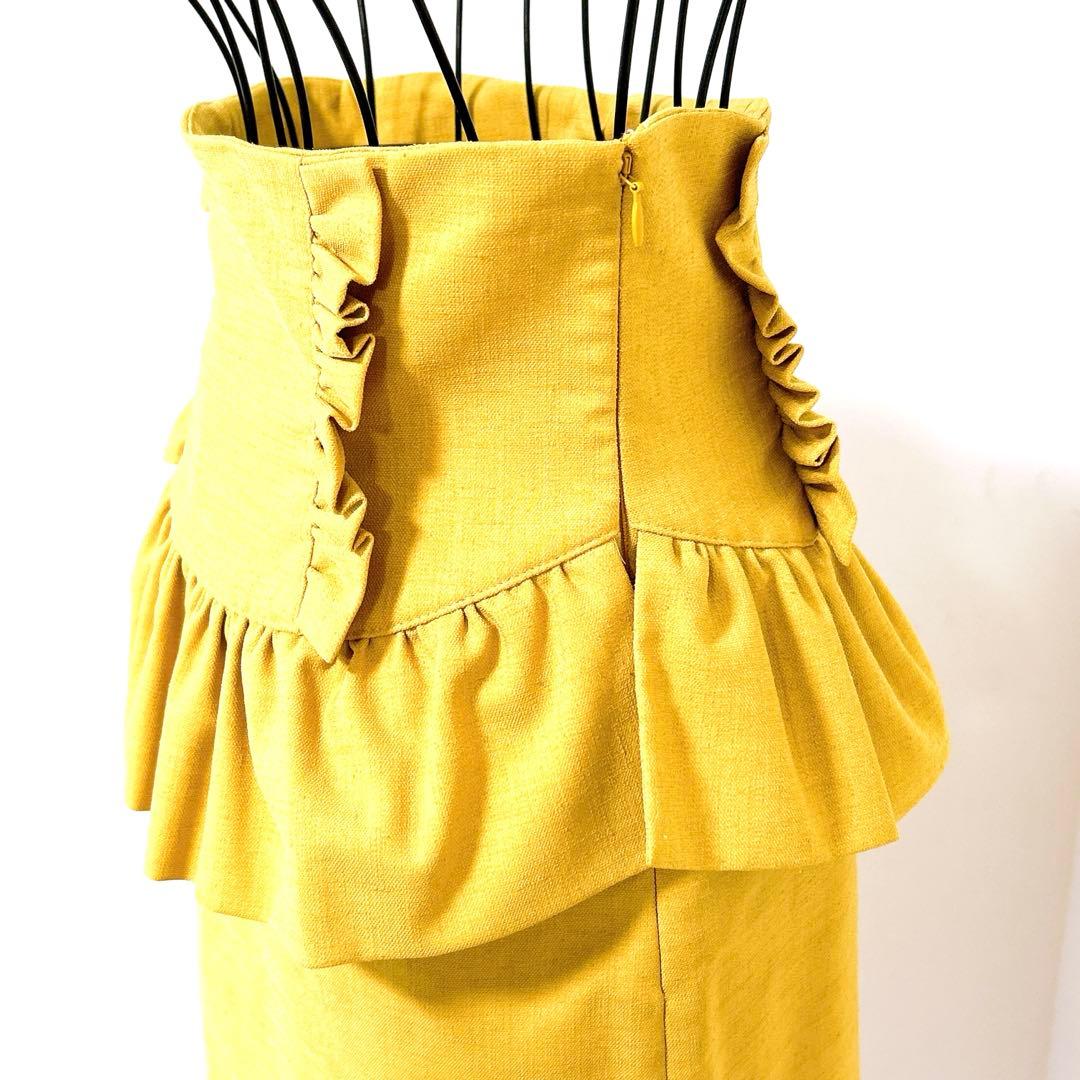 【新品タグ付】manielle ペプラムフリルスカート ゴールド【adk001】