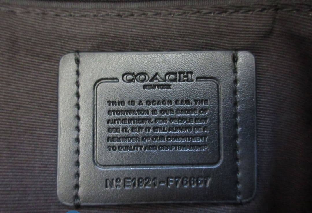 COACH ベア・グミプリントリュック