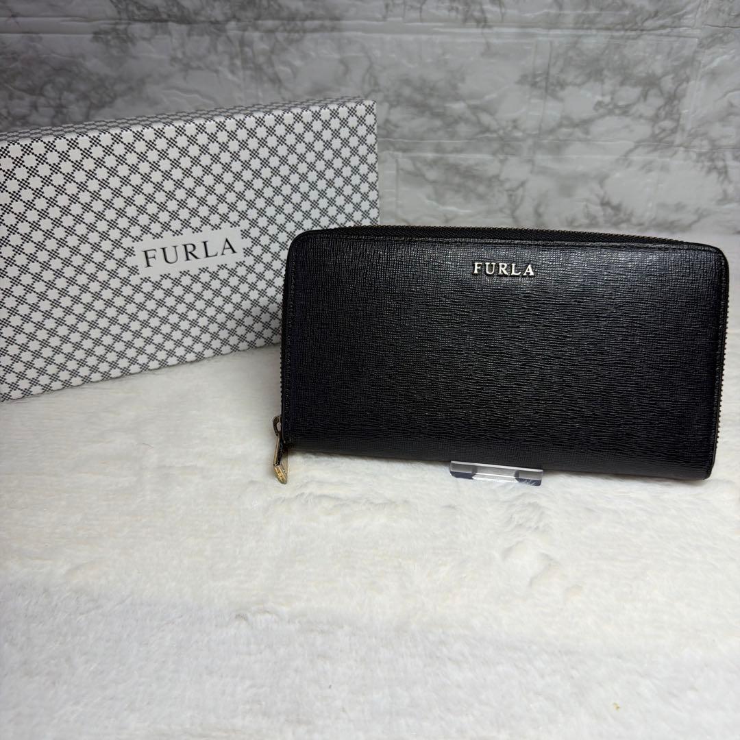FURLA ブラック ラウンドファスナー長財布 - メルカリ