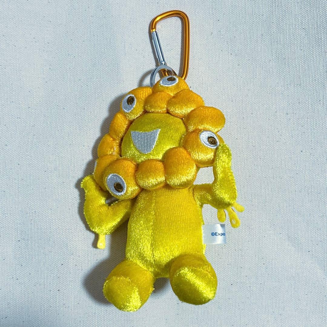 万博 ミャクミャク カラビナ付きマスコット 金色 ゴールド - メルカリ